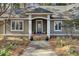 Inviting front entrance boasting a vibrant blue door, decorative potted plants, and a well-manicured pathway at 3334 Cottonfield Dr, Mount Pleasant, SC 29466