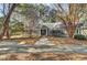 Home with gray paint, white trim, a long driveway and mature landscaping at 3334 Cottonfield Dr, Mount Pleasant, SC 29466