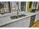 Kitchen sink featuring stainless steel, a window with a view to nature, and bright countertops at 3334 Cottonfield Dr, Mount Pleasant, SC 29466
