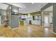 Spacious kitchen with wooden floors, a marble island, and white cabinetry at 3334 Cottonfield Dr, Mount Pleasant, SC 29466