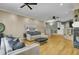 Cozy living room with comfortable seating, hardwood floors, and a fireplace at 3334 Cottonfield Dr, Mount Pleasant, SC 29466