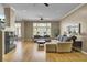 Bright living room features a fireplace, hardwood floors and ample windows at 3334 Cottonfield Dr, Mount Pleasant, SC 29466
