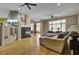 Spacious living room with fireplace, built-in cabinets, and hardwood floors at 3334 Cottonfield Dr, Mount Pleasant, SC 29466