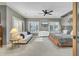 Comfortable bedroom with a large bed, sofa, and natural light at 3334 Cottonfield Dr, Mount Pleasant, SC 29466