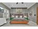 The main bedroom features a king bed, decorative lighting, and ceiling fan at 3334 Cottonfield Dr, Mount Pleasant, SC 29466