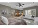 The main bedroom offers a sitting area, natural light, and modern decor at 3334 Cottonfield Dr, Mount Pleasant, SC 29466