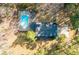 Overhead view of home with swimming pool, backyard, and long driveway at 405 Huntington Rd, Summerville, SC 29483