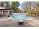 In-ground swimming pool featuring a diving board and slide in a large backyard at 405 Huntington Rd, Summerville, SC 29483
