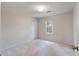 Simple bedroom with neutral carpet, one window, and a closet featuring white doors at 405 Huntington Rd, Summerville, SC 29483