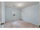 Comfortable blue bedroom features carpet, a window view, and closet with white doors at 405 Huntington Rd, Summerville, SC 29483