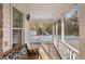 Screened porch view of swimming pool and backyard showcasing the outdoor living space at 405 Huntington Rd, Summerville, SC 29483