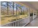 Picturesque view from the porch overlooking the expansive front lawn and mature trees at 405 Huntington Rd, Summerville, SC 29483