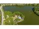 Breathtaking aerial view of waterfront property with lush landscaping and private dock at 411 Watergrass Way, Summerville, SC 29485
