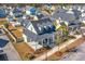 Beautiful home from above, showcasing a spacious porch and landscaped yard in a friendly neighborhood at 411 Watergrass Way, Summerville, SC 29485