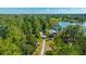 Picturesque outdoor pavilion nestled amongst towering trees and a scenic walking path at 411 Watergrass Way, Summerville, SC 29485