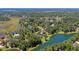 Beautiful aerial shot showcasing a community with waterfront homes surrounded by lush trees at 4162 Ten Shillings Way, Hollywood, SC 29470