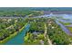 Stunning aerial view showcasing the property's waterfront location and lush surroundings, offering privacy and tranquility at 4162 Ten Shillings Way, Hollywood, SC 29470