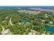 Stunning aerial view showcasing the waterfront community surrounded by lush greenery and waterways at 4162 Ten Shillings Way, Hollywood, SC 29470