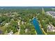 Stunning aerial view of lush community with scenic water views and custom luxury homes at 4162 Ten Shillings Way, Hollywood, SC 29470
