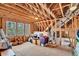 Unfinished attic space with exposed beams and framing, ready for customization at 4162 Ten Shillings Way, Hollywood, SC 29470