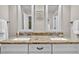Elegant bathroom featuring double sinks, granite countertops, and white cabinetry at 4162 Ten Shillings Way, Hollywood, SC 29470