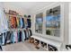 Bright walk-in closet with storage, shelving, natural light and space for organizing clothes and accessories at 4162 Ten Shillings Way, Hollywood, SC 29470