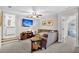 Inviting Gathering room with a comfortable sectional sofa, a flat-screen TV, and ample seating at 4162 Ten Shillings Way, Hollywood, SC 29470