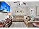 Spacious Gathering room featuring a sectional sofa, flat screen TV, and access to other rooms at 4162 Ten Shillings Way, Hollywood, SC 29470