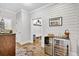 Stylish hallway with wood floors, shiplap walls, wine refrigerator, and decorative elements at 4162 Ten Shillings Way, Hollywood, SC 29470