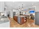 Spacious kitchen with stainless steel appliances and an open floor plan to the living room at 4162 Ten Shillings Way, Hollywood, SC 29470