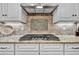 Granite countertops and tile backsplash at 4162 Ten Shillings Way, Hollywood, SC 29470
