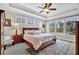 Comfortable main bedroom featuring a large window with a lake view at 4162 Ten Shillings Way, Hollywood, SC 29470
