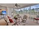 Comfortable screened-in porch featuring nice furniture and serene lake views at 4162 Ten Shillings Way, Hollywood, SC 29470