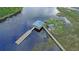 Drone shot of a private dock and boathouse, providing direct access to the waterway at 4385 Ten Shillings Way, Hollywood, SC 29470