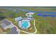 Overhead shot of a community pool, pool house and parking area showing water views at 4385 Ten Shillings Way, Hollywood, SC 29470