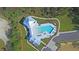 Drone view of the community pool and lounge area, showcasing the attractive landscaping and design at 4385 Ten Shillings Way, Hollywood, SC 29470