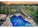 Aerial view of backyard with large custom pool, spa, and scenic view of surrounding landscape at 4385 Ten Shillings Way, Hollywood, SC 29470