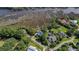 Aerial view of waterfront homes, docks, and marshland, capturing the beauty of the coastal landscape at 4385 Ten Shillings Way, Hollywood, SC 29470
