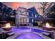 Captivating backyard featuring a luxurious pool, hot tub, and a charming two-story home at 4385 Ten Shillings Way, Hollywood, SC 29470