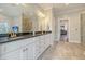 Luxurious bathroom featuring double vanity and sleek modern finishes at 4385 Ten Shillings Way, Hollywood, SC 29470