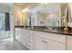 Bright bathroom with double vanity, granite countertop, and large mirror at 4385 Ten Shillings Way, Hollywood, SC 29470