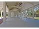 Covered porch area with comfortable rocking chairs for relaxation and enjoyment of the outdoors at 4385 Ten Shillings Way, Hollywood, SC 29470