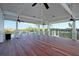 Large outdoor deck with a view of the water and beautiful architectural details at 4385 Ten Shillings Way, Hollywood, SC 29470