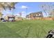 Large, well-maintained backyard with lush green grass and mature trees at 522 W Butternut Rd, Summerville, SC 29483