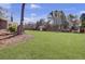 Spacious backyard featuring a storage shed with ample green space at 522 W Butternut Rd, Summerville, SC 29483