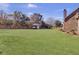 Expansive backyard with a storage shed and partially fenced perimeter at 522 W Butternut Rd, Summerville, SC 29483
