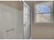 Small bathroom with a shower and window at 522 W Butternut Rd, Summerville, SC 29483