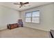 Bedroom has a rocking chair near the window at 522 W Butternut Rd, Summerville, SC 29483