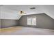 Angled bedroom with neutral carpet and ceiling fan at 522 W Butternut Rd, Summerville, SC 29483