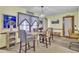 Open dining area featuring a farmhouse table and stylish chairs at 522 W Butternut Rd, Summerville, SC 29483